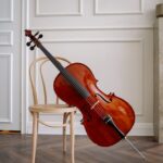 a cello beside a chair